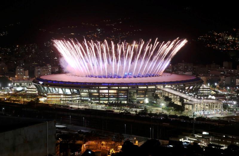 2016 Rio Olympics - Opening Ceremony - Maracana - Rio de Janeiro, Brazil - 05/08/2016. The Maracana Olympic Stadium during the opening ceremony is seen from the Mangueira favela. REUTERS/Pilar Olivares